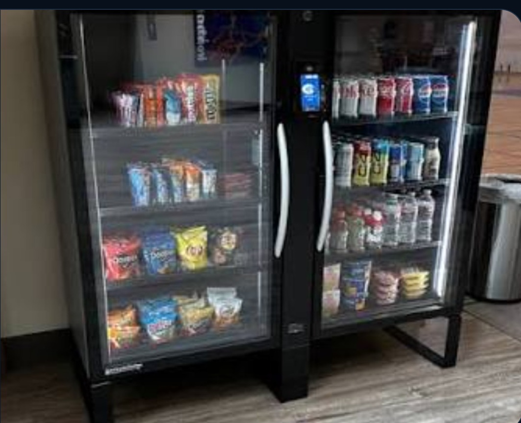 Compact side-by-side Stockwell cooler stocked with snacks and beverages